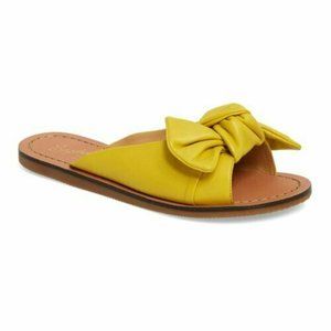 Seychelles, Yellow Bow-Accent Childlike Enthusiasm
